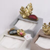 Servilletero Gris con Piedra Magenta y Brass